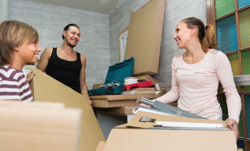 Commercial movers handling office furniture in Dulwich storage facility